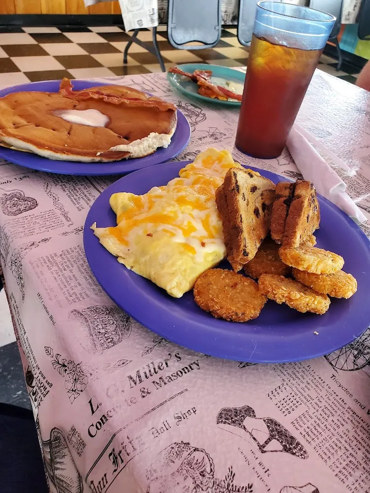 Omelet Raisin Toast and Hash Browns